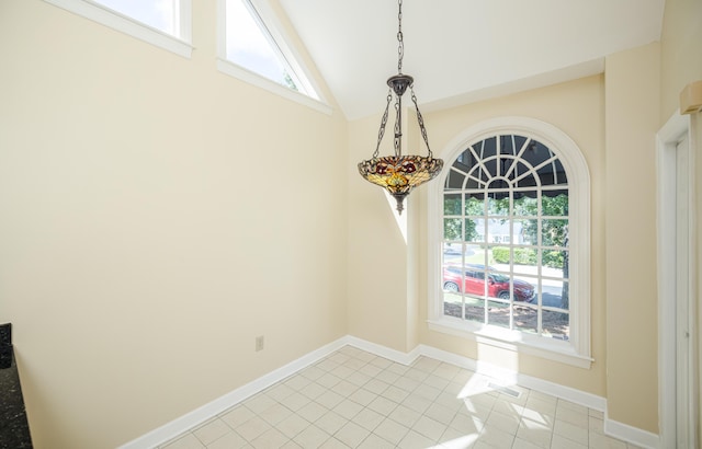 3701 Wexford Dr, Martinez, GA 30907 - unfurnished dining area featuring plenty of natural light, light tile patterned floors, and vaulted ceiling