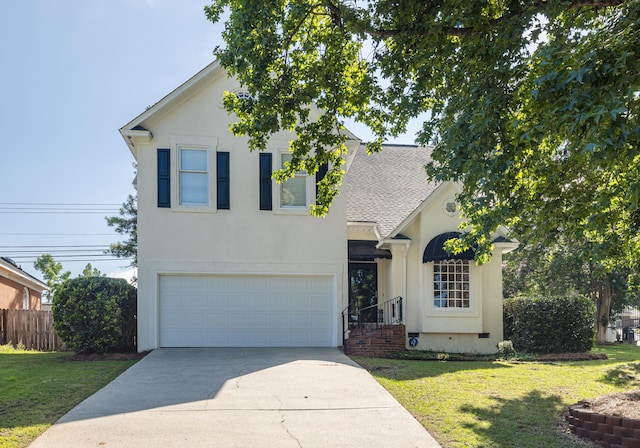 3701 Wexford Dr, Martinez, GA 30907 - traditional home featuring stucco siding, driveway, an attached garage, and roof with shingles
