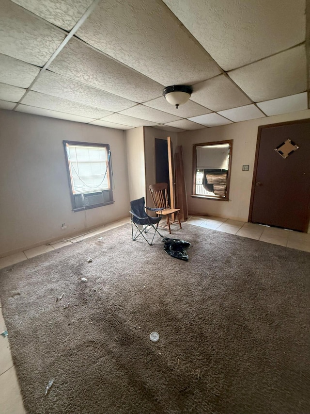 205 Addison St, Johnston, SC 29832 - unfurnished room with a paneled ceiling, carpet floors, and tile patterned floors