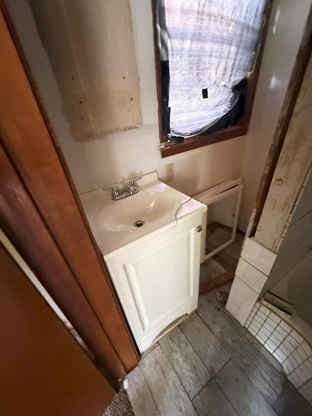 205 Addison St, Johnston, SC 29832 - bathroom with vanity and wood finished floors