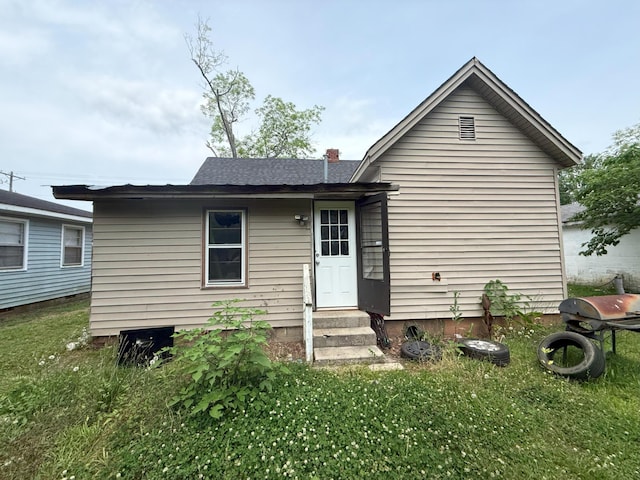 205 Addison St, Johnston, SC 29832 - rear view of house featuring a yard and entry steps