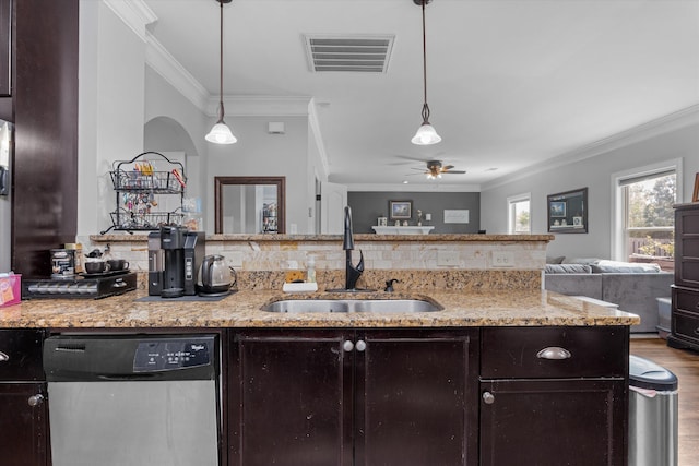kitchen featuring ornamental molding, open floor plan, visible vents, dishwasher, and a sink