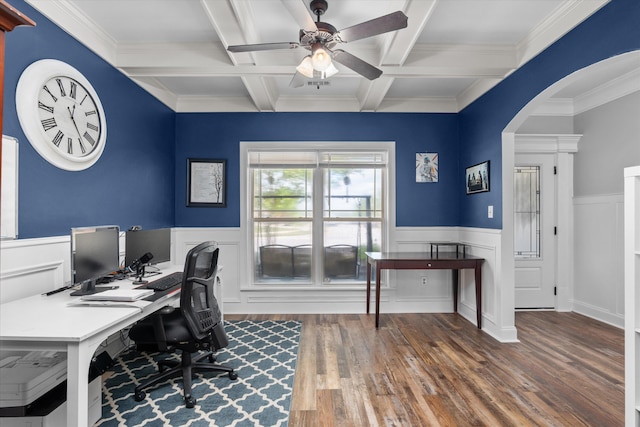office area featuring ceiling fan, beamed ceiling, coffered ceiling, arched walkways, and wood finished floors