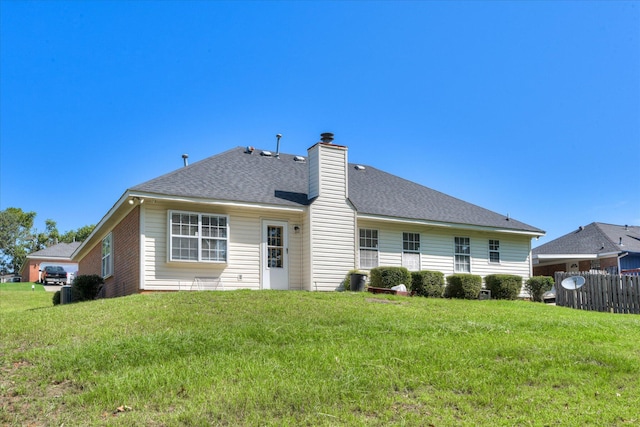3650 Crawfordville Dr, Augusta, GA 30909 - rear view of house featuring a shingled roof and a chimney