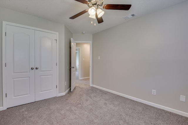 3650 Crawfordville Dr, Augusta, GA 30909 - unfurnished bedroom featuring light carpet, a closet, and a ceiling fan