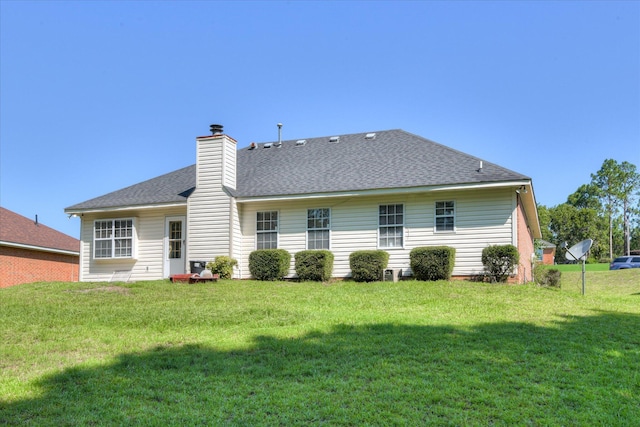 3650 Crawfordville Dr, Augusta, GA 30909 - back of property featuring a lawn, a chimney, and a shingled roof