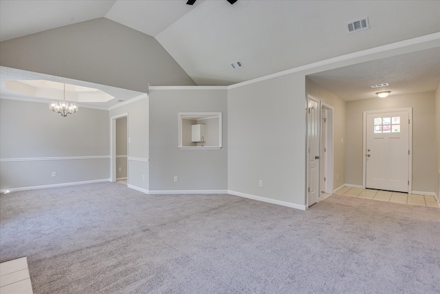 3650 Crawfordville Dr, Augusta, GA 30909 - unfurnished living room featuring light colored carpet, a chandelier, vaulted ceiling, and ceiling fan