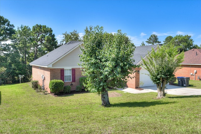 3650 Crawfordville Dr, Augusta, GA 30909 - view of property hidden behind natural elements featuring concrete driveway, brick siding, a front yard, an attached garage, and a shingled roof