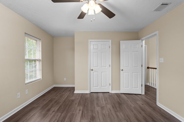 1094 Hampstead Pl, Martinez, GA 30907 - unfurnished bedroom featuring dark wood-style floors and a ceiling fan