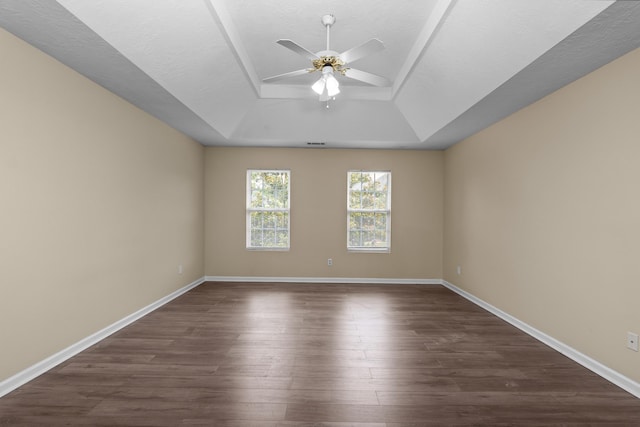 1094 Hampstead Pl, Martinez, GA 30907 - empty room with a tray ceiling, ceiling fan, and dark wood-style floors