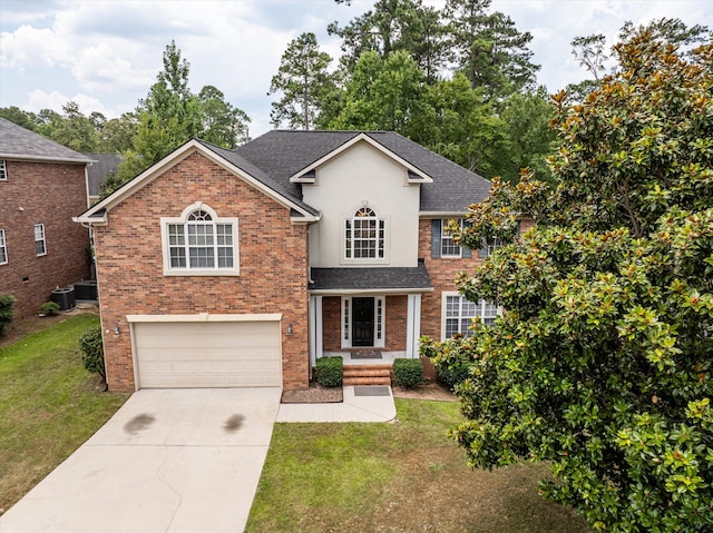 1094 Hampstead Pl, Martinez, GA 30907 - traditional-style home featuring driveway, a front lawn, a shingled roof, a garage, and brick siding