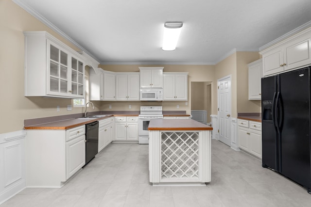1094 Hampstead Pl, Martinez, GA 30907 - kitchen featuring black appliances, white cabinetry, ornamental molding, glass insert cabinets, and a kitchen island