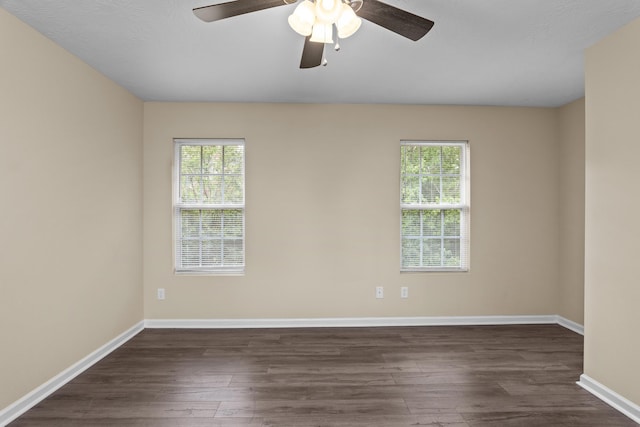 1094 Hampstead Pl, Martinez, GA 30907 - unfurnished room featuring dark wood-style flooring, healthy amount of natural light, and ceiling fan