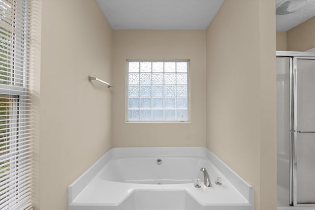 1094 Hampstead Pl, Martinez, GA 30907 - full bath with healthy amount of natural light, a stall shower, and a bath