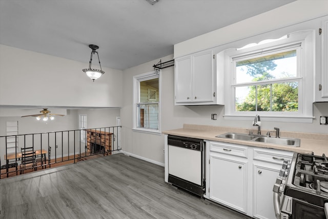 172 Creek View Ct, Martinez, GA 30907 - kitchen featuring dishwasher, stainless steel range with gas cooktop, light countertops, light wood finished floors, and white cabinets
