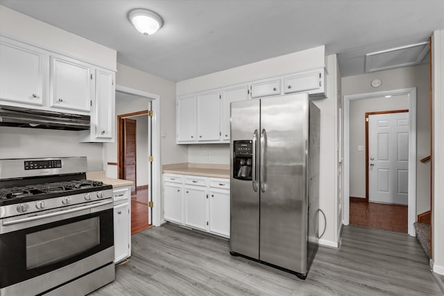 172 Creek View Ct, Martinez, GA 30907 - kitchen with stainless steel appliances, under cabinet range hood, light wood-style flooring, and white cabinetry