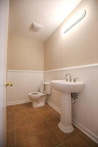 bathroom featuring toilet