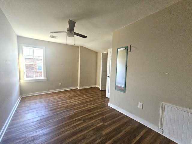 unfurnished room featuring ceiling fan and dark hardwood / wood-style floors