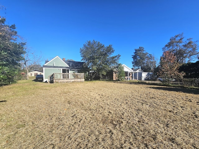 view of yard featuring a deck