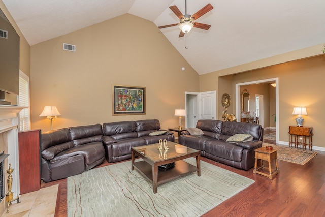 821 Wickham Dr, Graniteville, SC 29829 - living room featuring a premium fireplace, a ceiling fan, high vaulted ceiling, wood finished floors, and baseboards