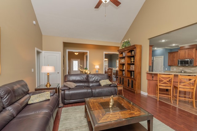 821 Wickham Dr, Graniteville, SC 29829 - living area with a ceiling fan, dark wood-type flooring, and high vaulted ceiling