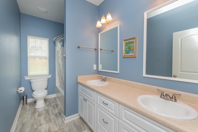 821 Wickham Dr, Graniteville, SC 29829 - bathroom with double vanity, toilet, shower / tub combo with curtain, and baseboards