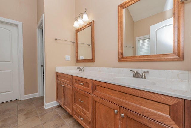 821 Wickham Dr, Graniteville, SC 29829 - bathroom featuring double vanity and baseboards