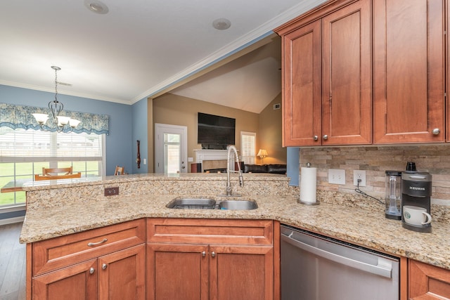 821 Wickham Dr, Graniteville, SC 29829 - kitchen featuring dishwasher, a sink, a peninsula, a chandelier, and brown cabinetry