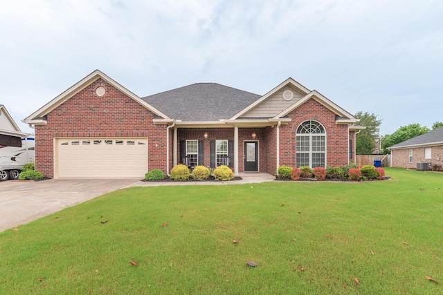 821 Wickham Dr, Graniteville, SC 29829 - view of front of property featuring brick siding, a garage, cooling unit, and driveway
