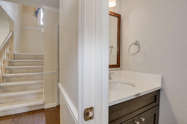 786 Springbrook Ln, Evans, GA 30809 - bathroom with vanity, wood finished floors, and ornamental molding