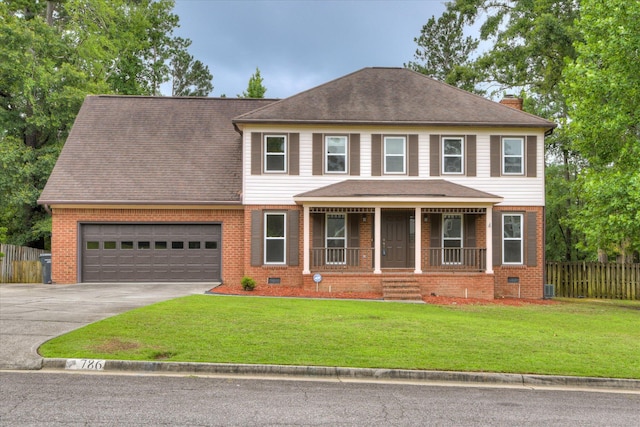 786 Springbrook Ln, Evans, GA 30809 - view of front of house with a porch, brick siding, a chimney, a garage, and driveway