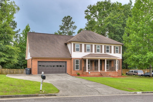 786 Springbrook Ln, Evans, GA 30809 - view of front of house featuring covered porch, brick siding, a garage, driveway, and a shingled roof