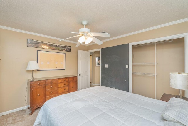 345 Old Salem Way, Martinez, GA 30907 - bedroom with ornamental molding, a closet, light colored carpet, a textured ceiling, and a ceiling fan