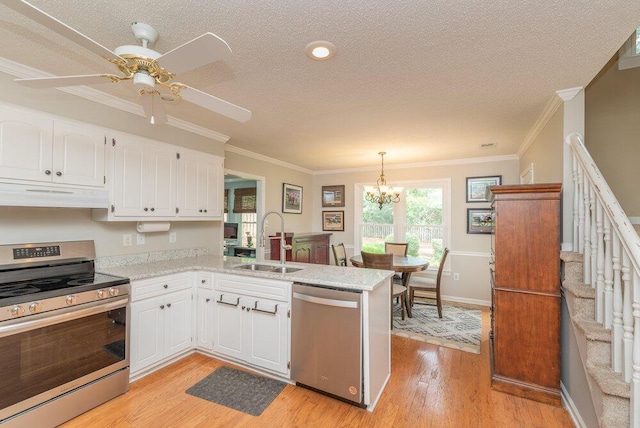 345 Old Salem Way, Martinez, GA 30907 - kitchen featuring stainless steel appliances, under cabinet range hood, a peninsula, white cabinets, and crown molding