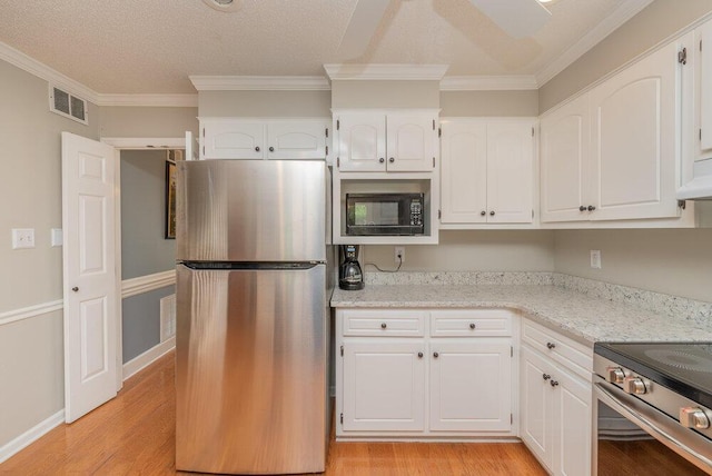 345 Old Salem Way, Martinez, GA 30907 - kitchen featuring stainless steel appliances, crown molding, light wood-style flooring, white cabinets, and light stone counters
