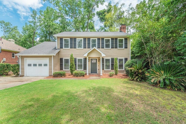 345 Old Salem Way, Martinez, GA 30907 - colonial house with a chimney, driveway, a garage, and a front yard
