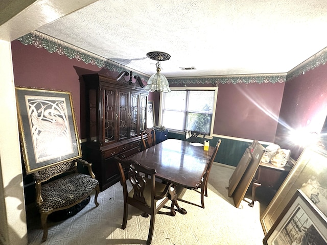 6322 Yelton Rd, Appling, GA 30802 - dining space with a textured ceiling and a chandelier