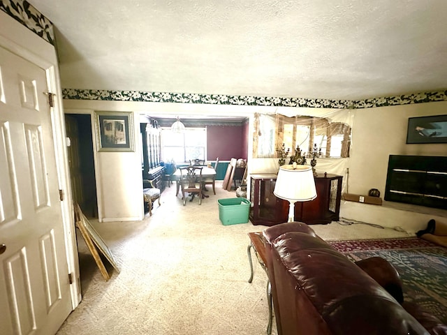6322 Yelton Rd, Appling, GA 30802 - carpeted living area with a textured ceiling and a fireplace