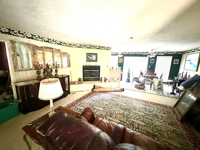 6322 Yelton Rd, Appling, GA 30802 - living area featuring carpet, plenty of natural light, and a textured ceiling