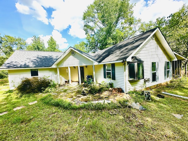 6322 Yelton Rd, Appling, GA 30802 - ranch-style house with a shingled roof and a porch