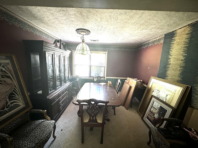 6322 Yelton Rd, Appling, GA 30802 - dining space with carpet floors and a textured ceiling