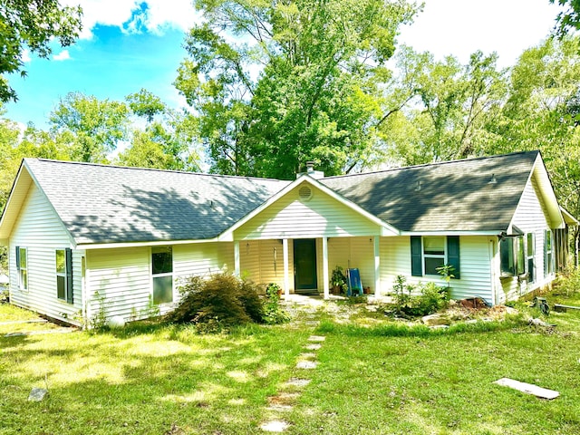 6322 Yelton Rd, Appling, GA 30802 - view of front of house featuring a shingled roof and a front lawn