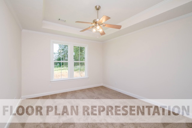 unfurnished room with visible vents, crown molding, ceiling fan, a tray ceiling, and light carpet