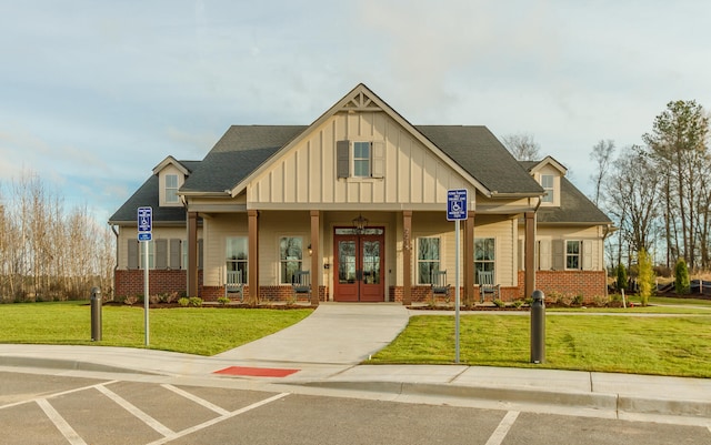 329 Holly Oak Way Unit Sc79, Grovetown, GA 30813 - view of front of property with a front lawn, a porch, board and batten siding, french doors, and brick siding