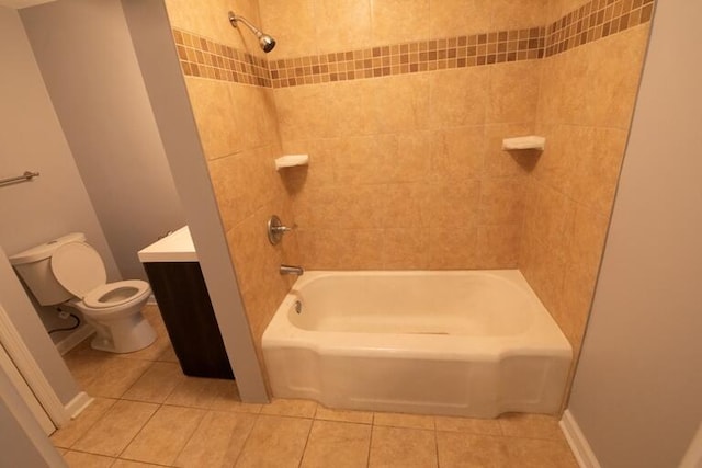 bathroom with toilet, tile patterned floors, vanity, and bathtub / shower combination