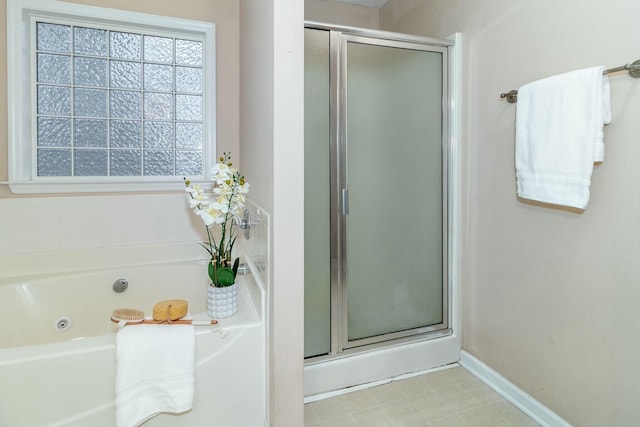 bathroom with independent shower and bath