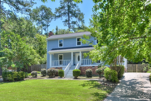 421 Bristol Rd, Martinez, GA 30907 - view of front of property with a porch, a chimney, and concrete driveway