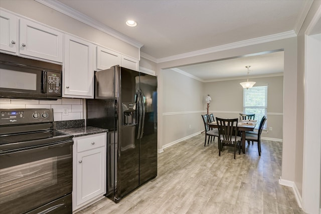 421 Bristol Rd, Martinez, GA 30907 - kitchen with black appliances, ornamental molding, light wood-type flooring, white cabinets, and decorative light fixtures