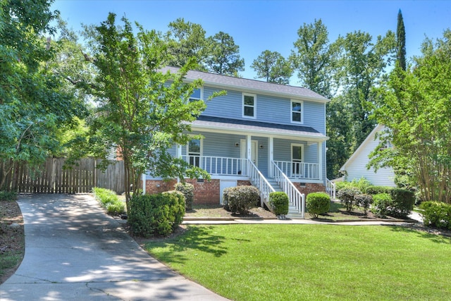 421 Bristol Rd, Martinez, GA 30907 - view of front facade featuring covered porch, a front yard, and driveway