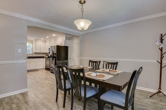 421 Bristol Rd, Martinez, GA 30907 - dining area featuring light wood-style floors and ornamental molding